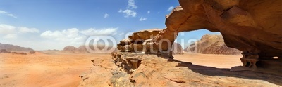 natural bridge and panoramic view of Wadi Rum desert, Jordan