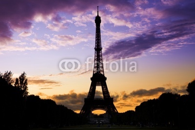 Eiffel Tower against a coloful sunset