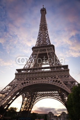 Wide angle of the Eiffel Tower against a nice sky at sunset