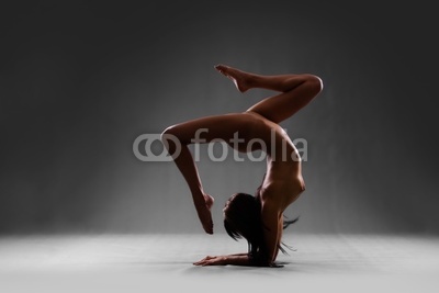 Art nude of gymnast in athletic pose