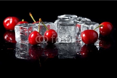 Fresh cherries with ice cubes