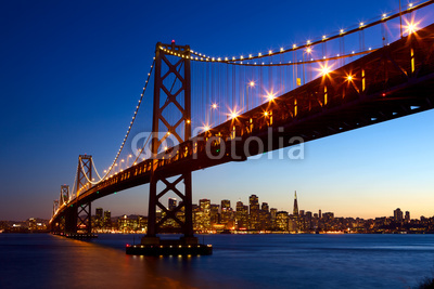 San Francisco skyline and Bay Bridge at sunset, California, USA