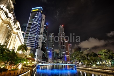Central Business District of Singapore night at Boat Quay bridge