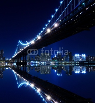 New York City Skyline and Manhattan Bridge At Night