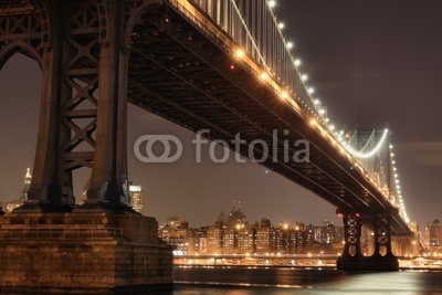 New York City Skyline and Manhattan Bridge At Night