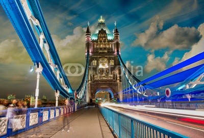 Beautiful night view of Tower Bridge with car lights trails