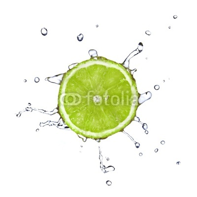 Slice of lime with water drops isolated on white