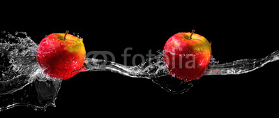 Apples in water stream