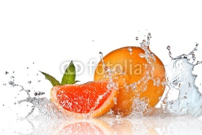 Water splash on grapefruit with mint isolated on white