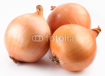 Fresh bulbs of onion on a white background