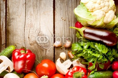 Healthy Organic Vegetables on a Wood Background