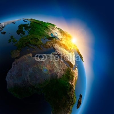 Sunrise over the Earth in outer space