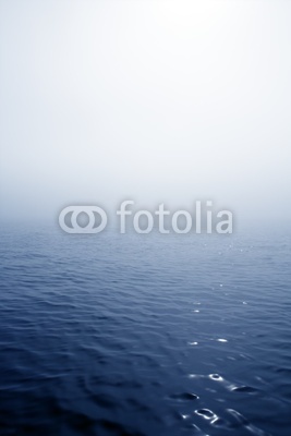 Blue fog sea in a foggy day with low ocean visibility