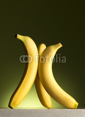 Bananas on  green background